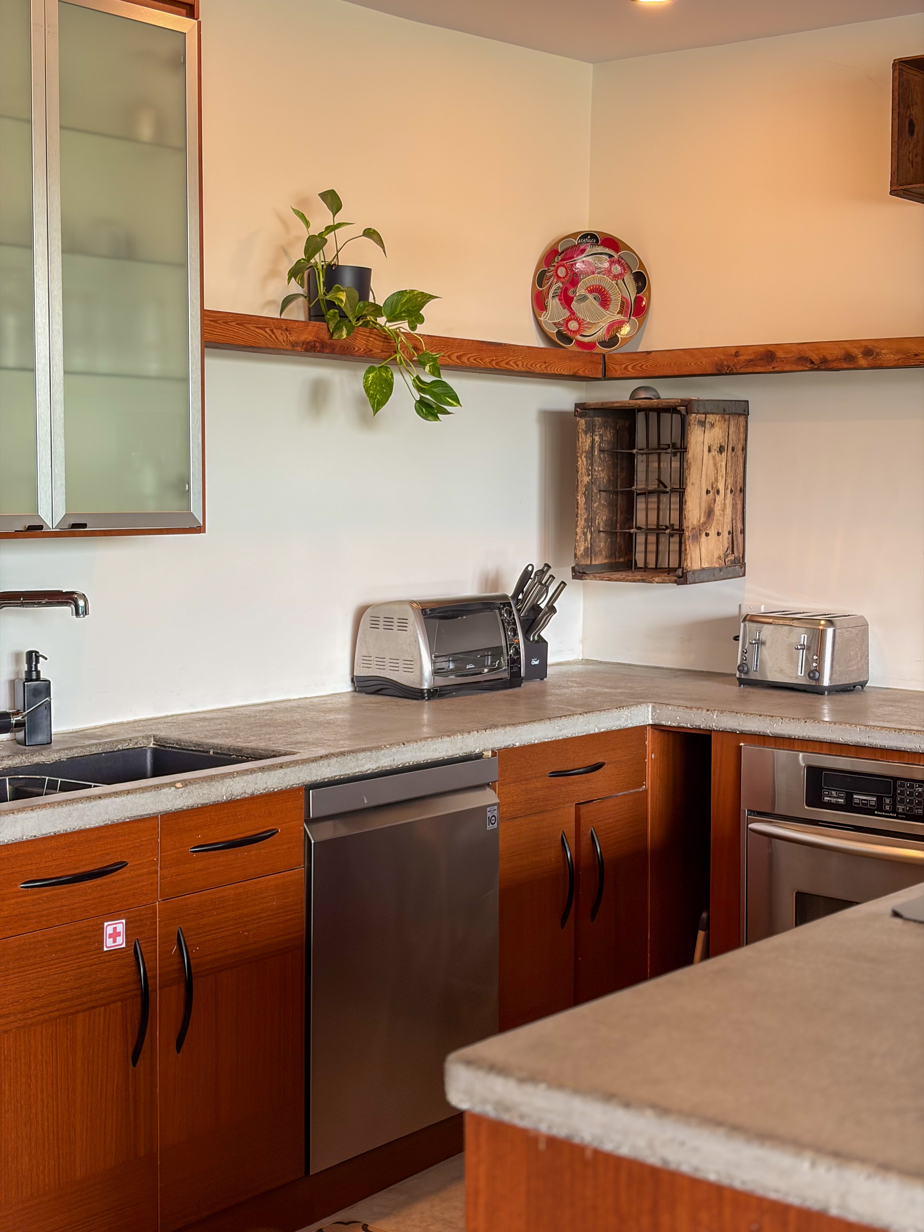 The fully equipped kitchen of a unit at Le Nordik Réserve Boréale