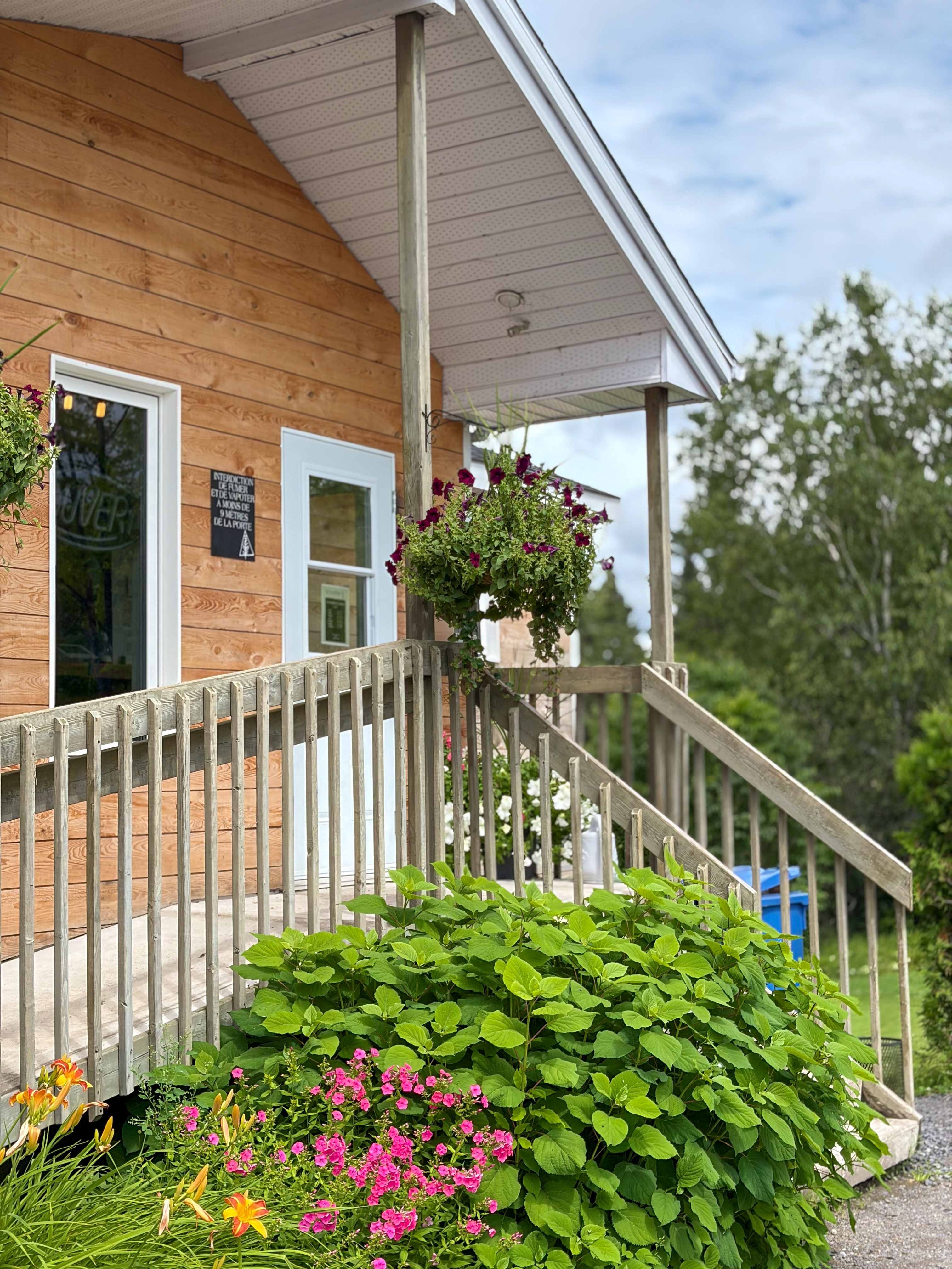 A flower-lined porch at the entrance of one of the estate's units