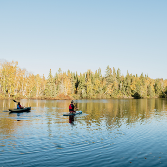 Kayaking and paddleboarding on Lac des Chicots in the fall